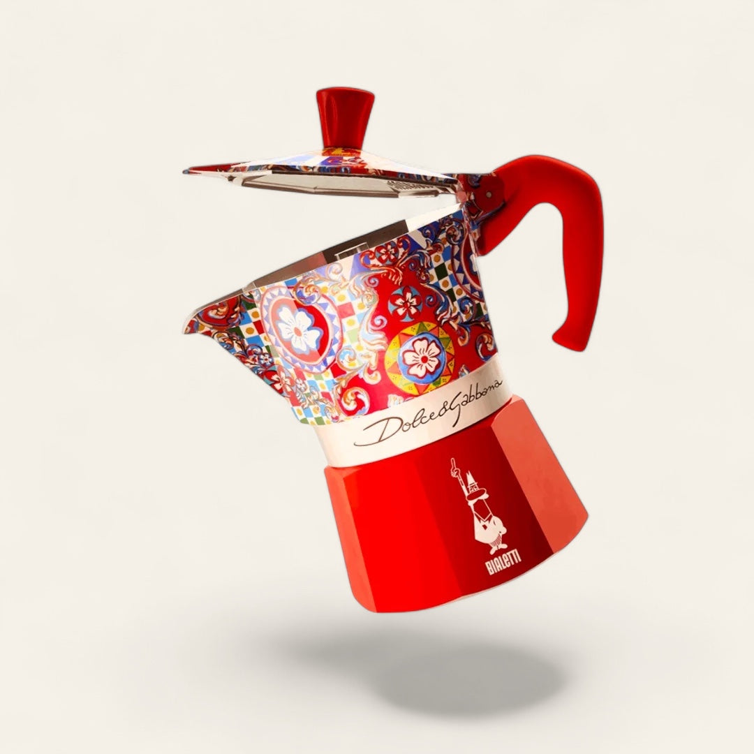 Bialetti x Dolce & Gabana Sicilian Red Moka Express floating on beige background